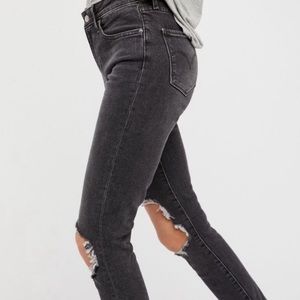 Levi’s 721 high rise skinny black distressed jeans